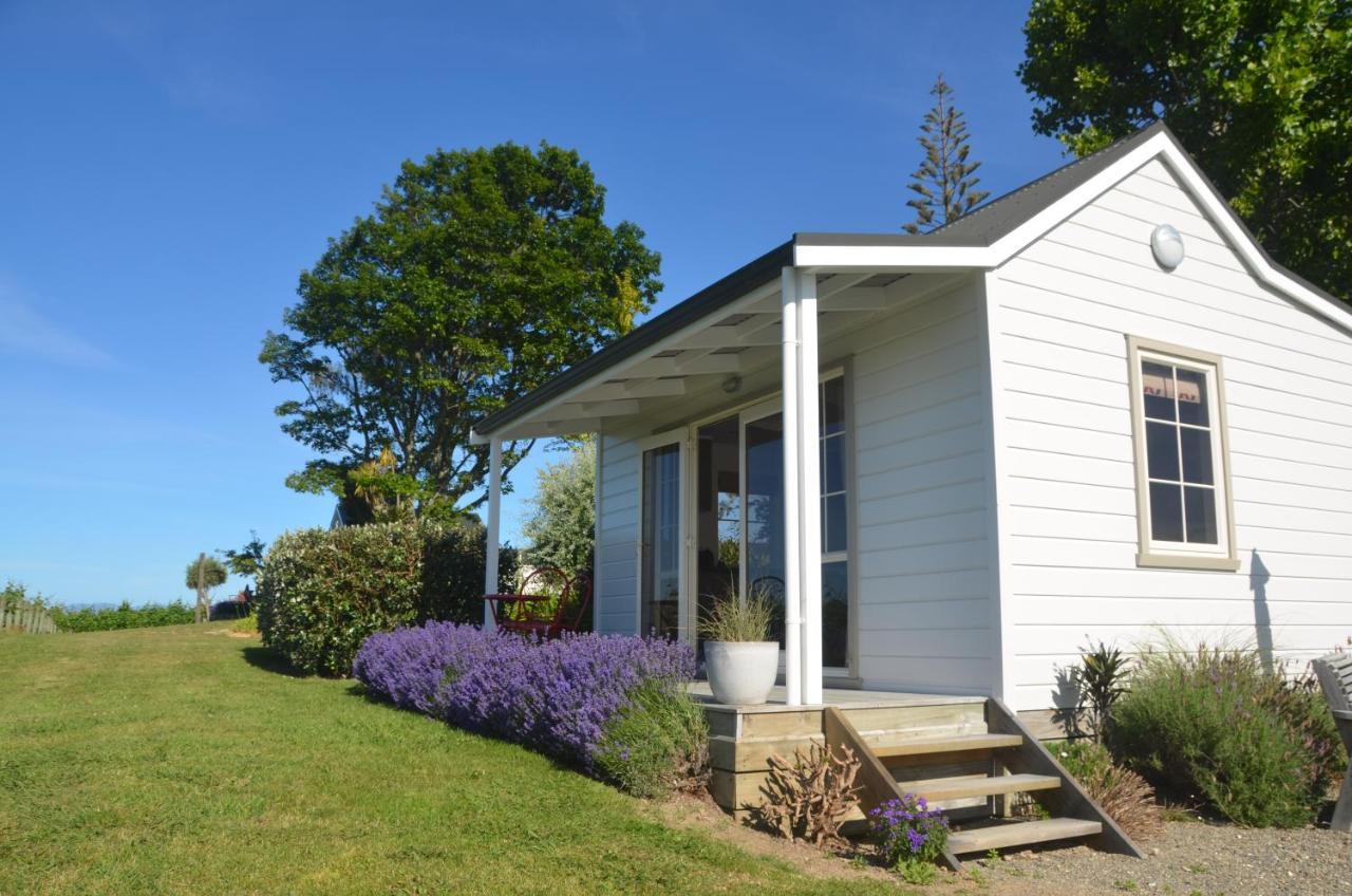 Kina Beach Cottages Tasman Exterior photo